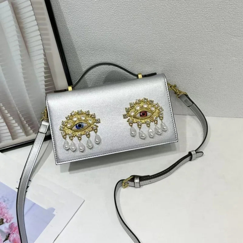 Sac bandoulière femme en simili cuir PU – Décor yeux 3D