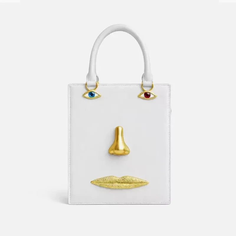 Sac bandoulière femme à visage décoratif et yeux bijoux
