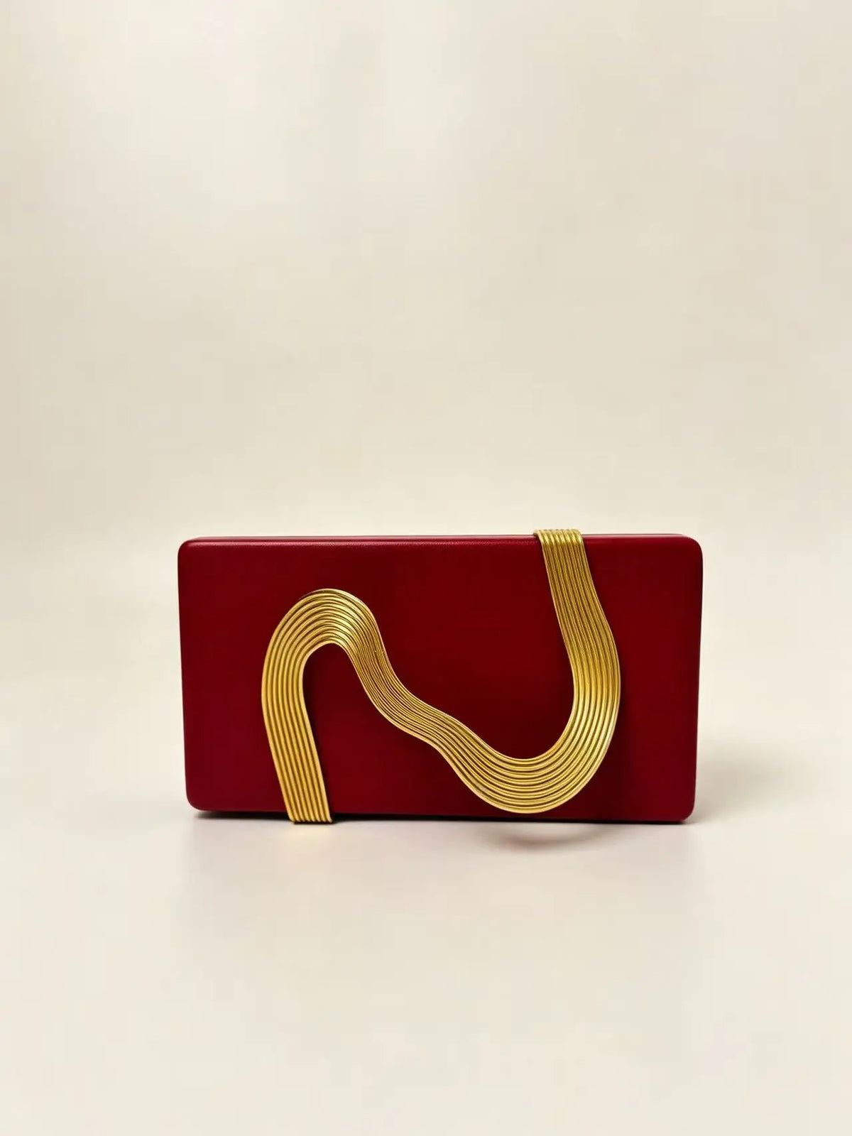 Pochette de soirée femme en simili cuir avec décor métallique