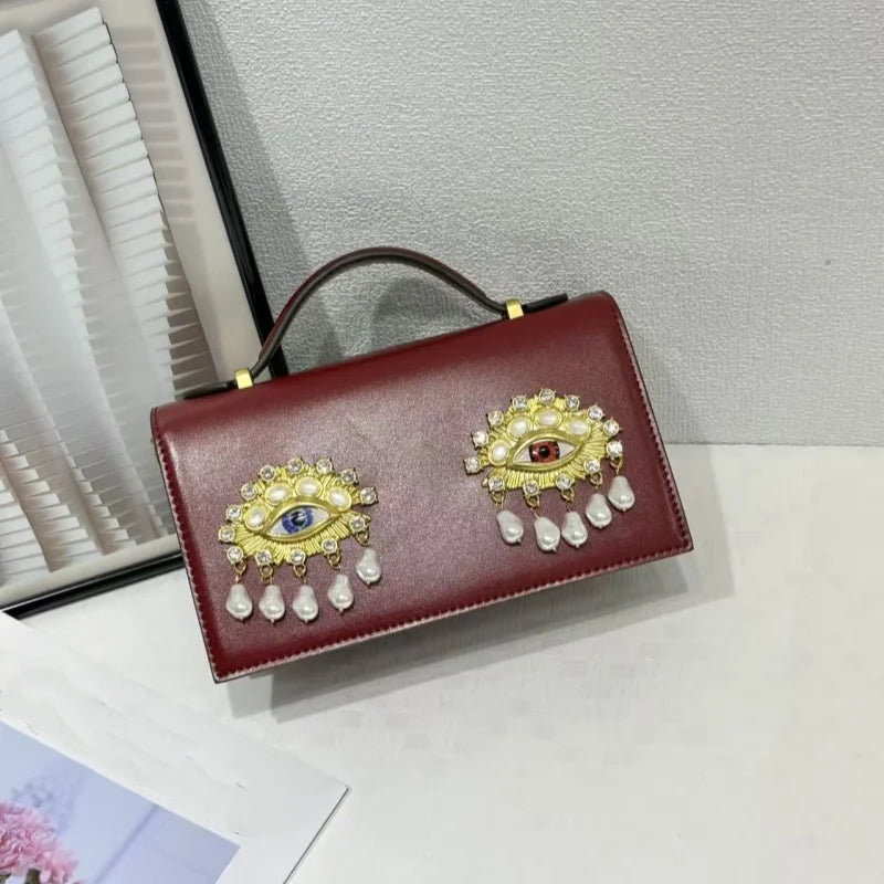 Sac bandoulière femme en simili cuir PU – Décor yeux 3D