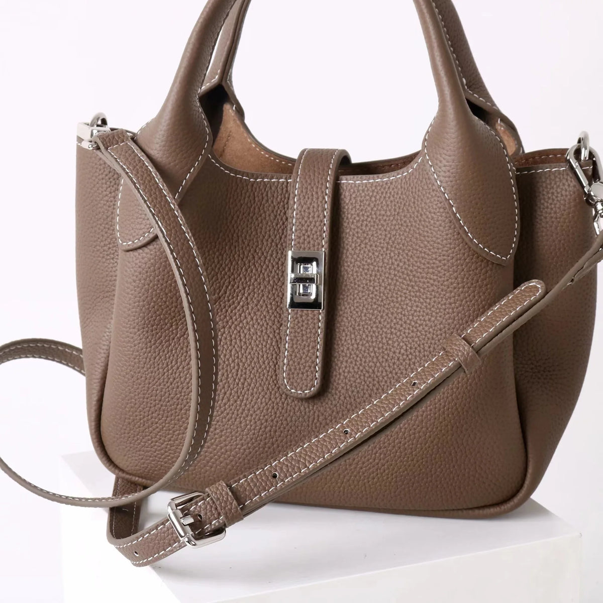 2026 Neue hochwertige Damen-Eimertasche aus Rindsleder, kleine Schulter-Umhängetasche, elegante Pendlerhandtasche für Damen, Grau
