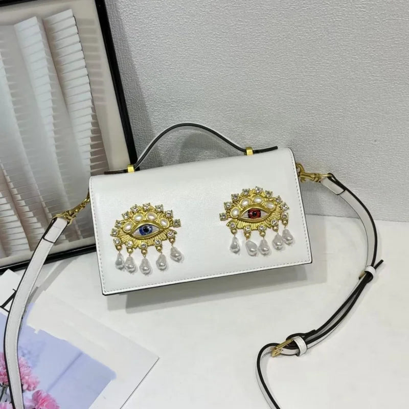 Sac bandoulière femme en simili cuir PU – Décor yeux 3D