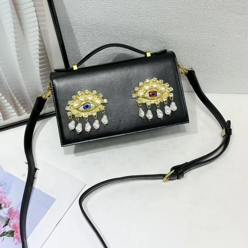 Sac bandoulière femme en simili cuir PU – Décor yeux 3D