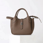 2026 Neue hochwertige Damen-Eimertasche aus Rindsleder, kleine Schulter-Umhängetasche, elegante Pendlerhandtasche für Damen, Grau
