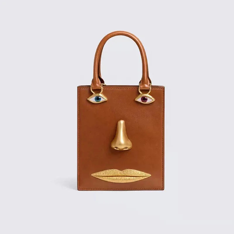 Sac bandoulière femme à visage décoratif et yeux bijoux
