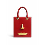 Sac bandoulière femme à visage décoratif et yeux bijoux
