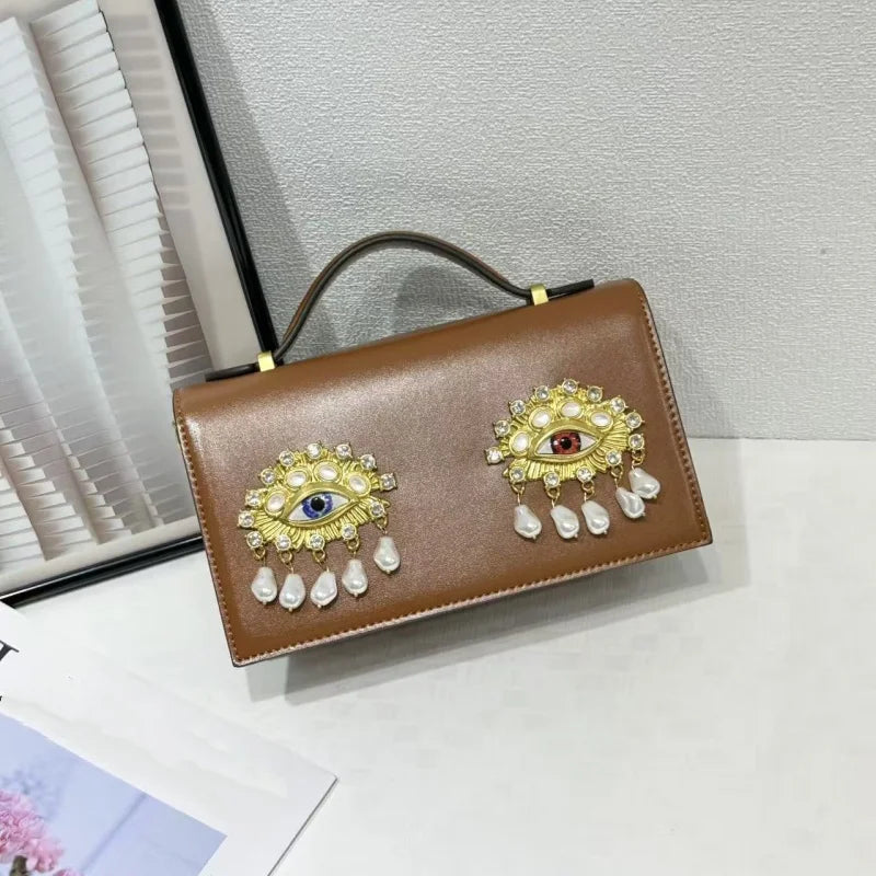 Sac bandoulière femme en simili cuir PU – Décor yeux 3D