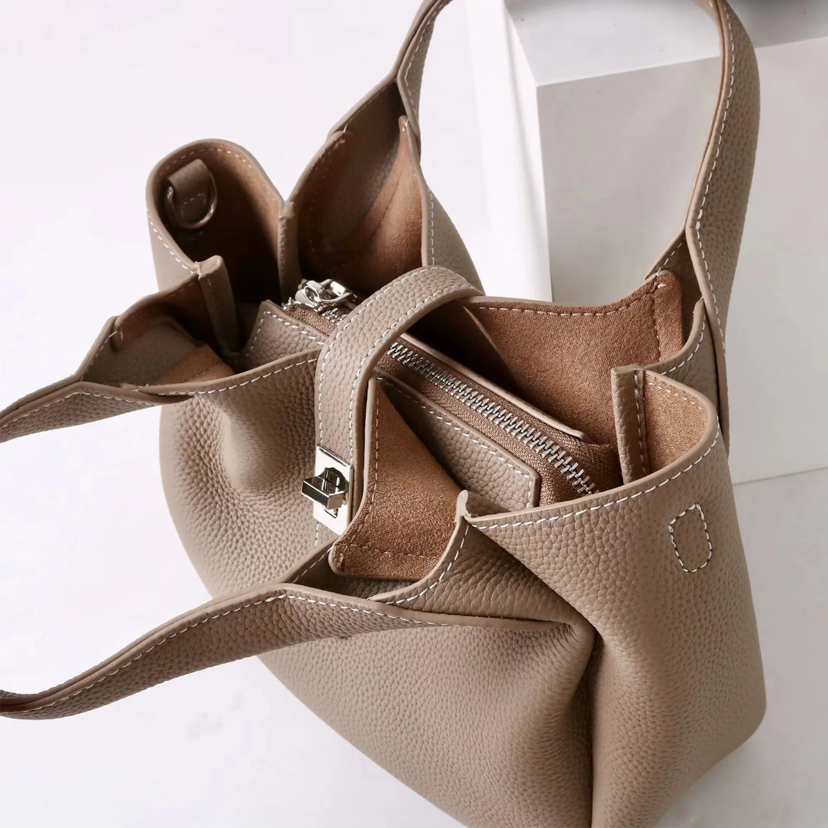2026 Neue hochwertige Damen-Eimertasche aus Rindsleder, kleine Schulter-Umhängetasche, elegante Pendlerhandtasche für Damen, Grau