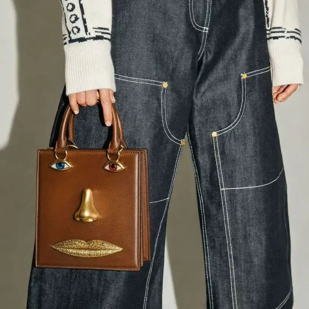 Sac bandoulière femme à visage décoratif et yeux bijoux